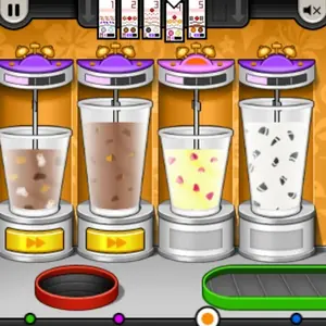 Freezeria drink station with four tall cups being blended